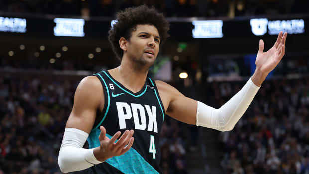 Trail Blazers guard Matisse Thybulle (4) reacts to a foul call against the Jazz in the third quarter at Vivint Arena.